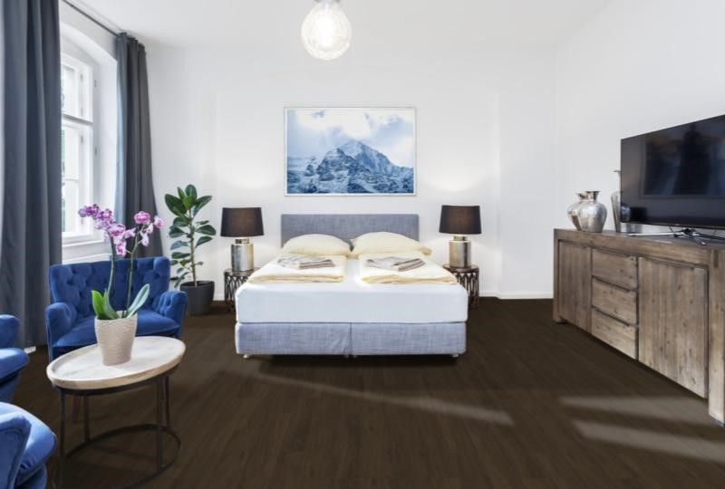 bedroom with laminate flooring