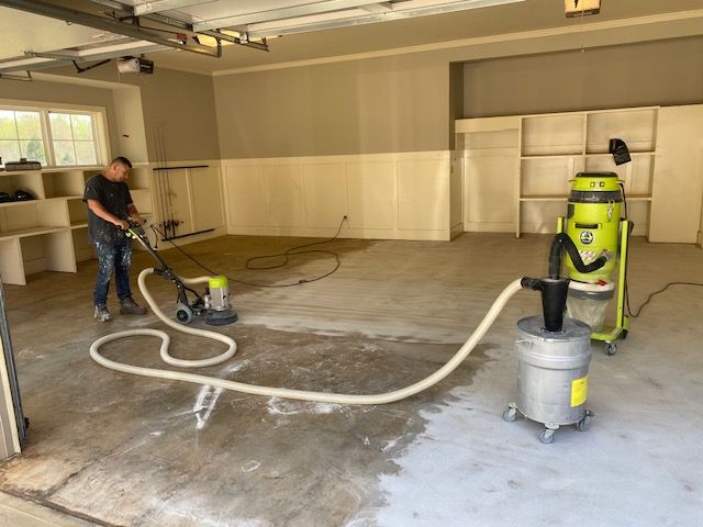 worker sanding floor